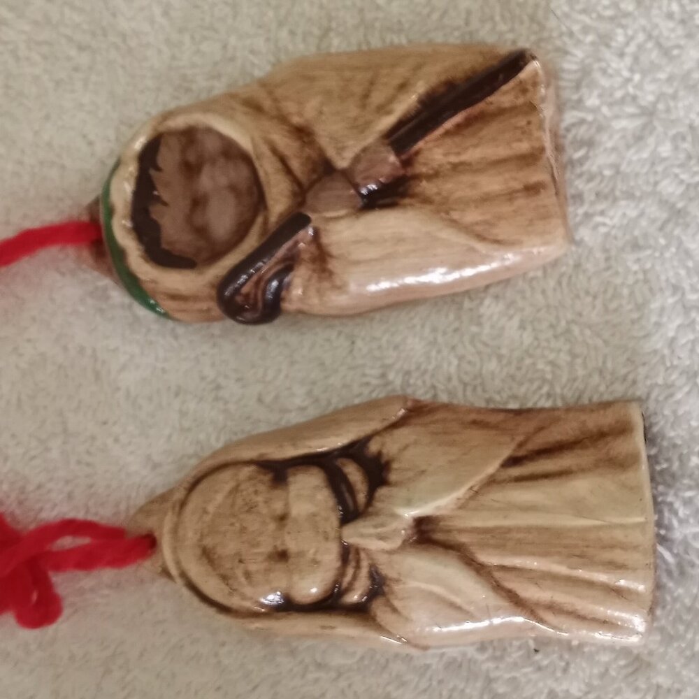 pair of vintage handmade ceramic ornaments